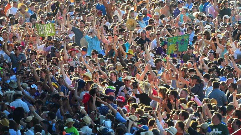 Horse racing enthusiasts at the Belmont Stakes on Saturday, June...