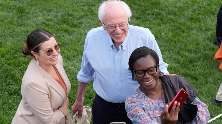 Sen. Bernie Sanders, I-Vt., center, attends a Congressional picnic on...