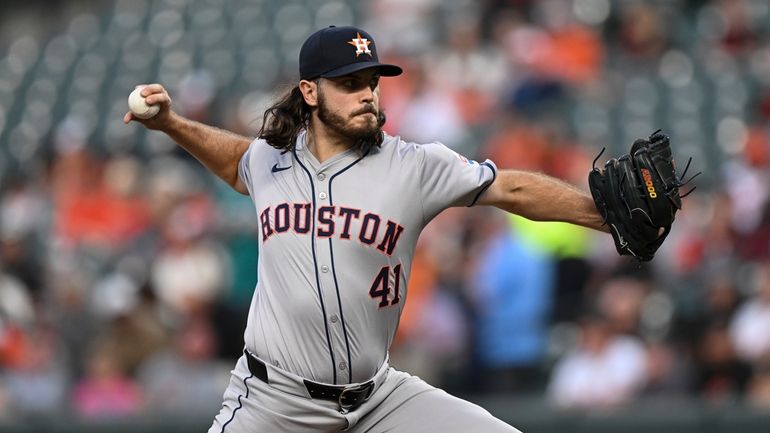 Houston Astros pitcher Spencer Arrighetti throws during the first inning...