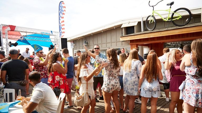 People dancing the day away at Flynn’s in Ocean Bay Park...