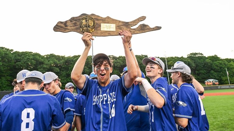 Matt Neglia of Hauppauge proudly displays the winning plaque after...