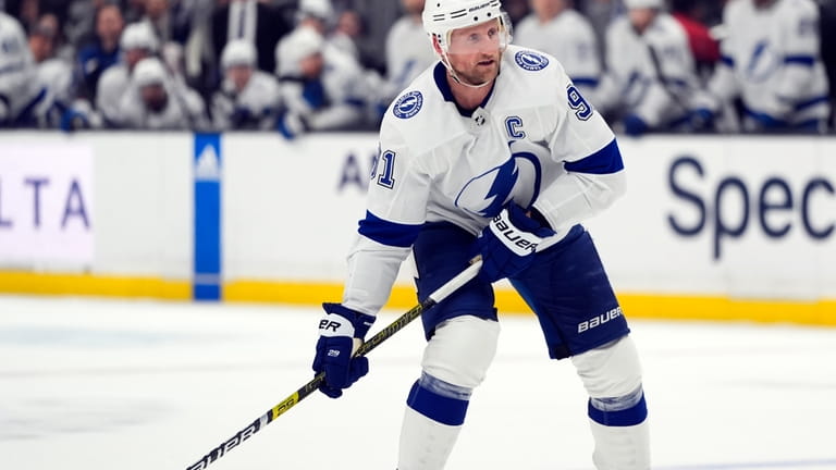 Tampa Bay Lightning center Steven Stamkos moves the puck during...
