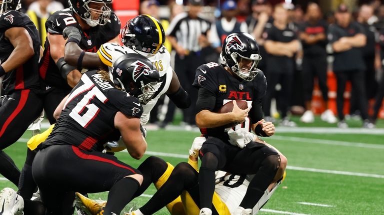 Pittsburgh Steelers linebacker T.J. Watt (90) sacks Atlanta Falcons quarterback...