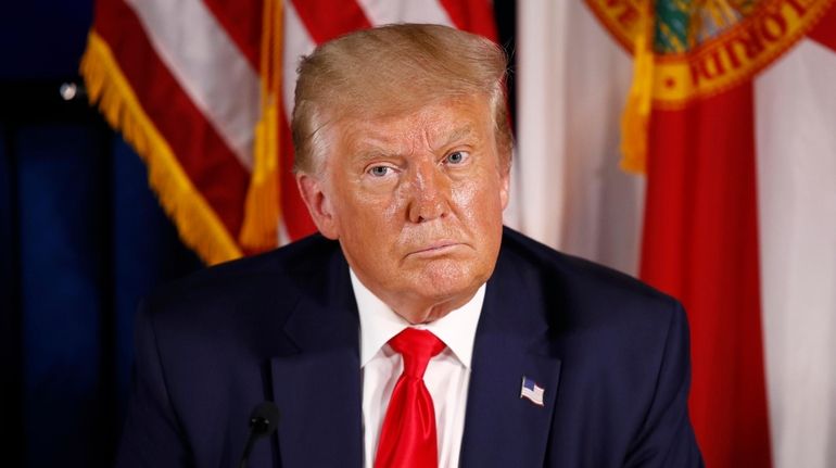 President Donald Trump participates at Pelican Golf Club in Belleair, Fla....