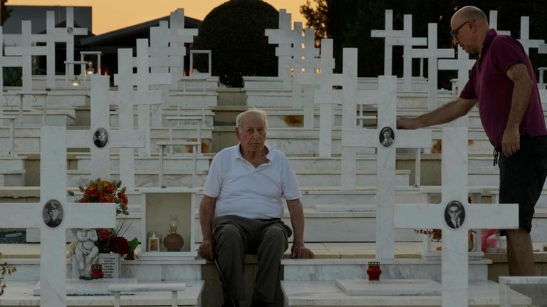 Loucas Alexandrou, 94, and his younger son Vassos Alexandrou, 61,...