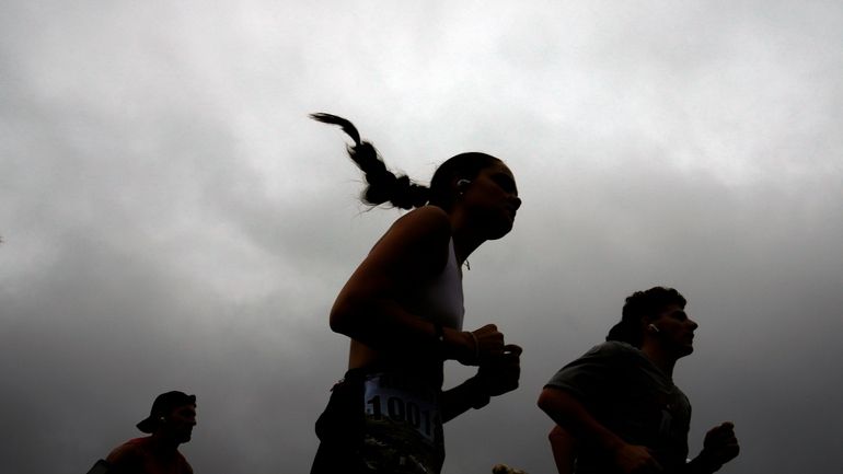 Runners compete in the Falmouth Road Race, Sunday, Aug. 18,...