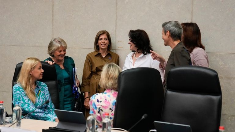 File - From left, European Commissioner for International Partnerships Jutta...