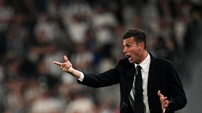 Juventus head coach Thiago Motta shouts at the sideline during...