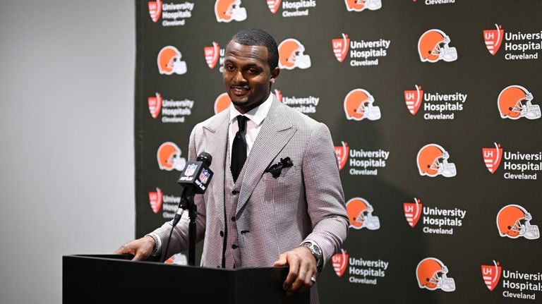 Cleveland Browns quarterback Deshaun Watson answers a question from a...