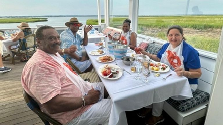 Malry and Dian Tardd, of Quogue, in the foreground, with...