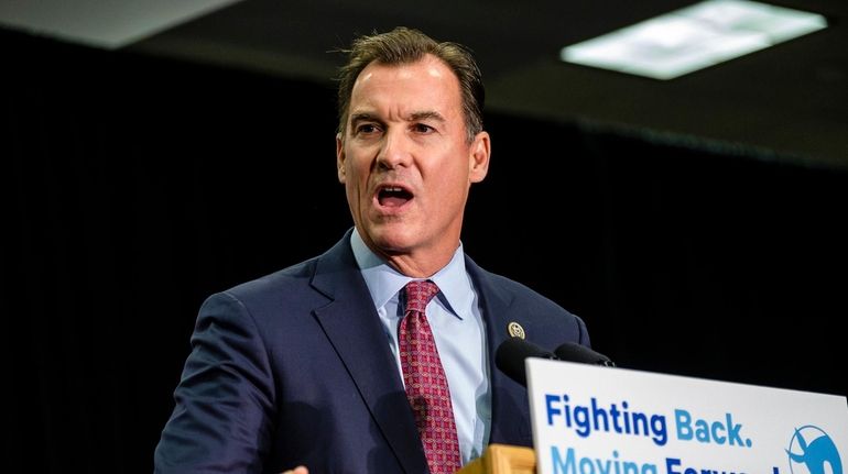 Tom Suozzi speaks during a get out the vote rally...