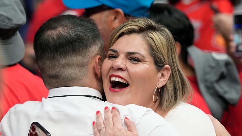 Former state lawmaker Raquel Teran hugs a supporter as she...