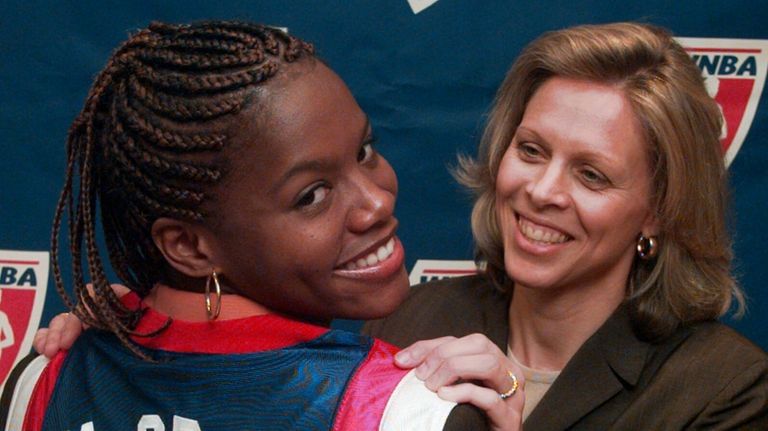 Nikki McCray models a Women's National Basketball Association jersey with...