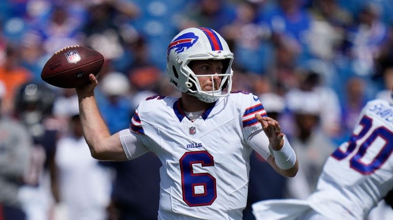 Buffalo Bills quarterback Shane Buechele throws during the second half...