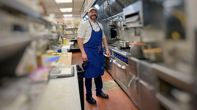 Chef Francis Derby in the kitchen of his Patchogue restaurant,...