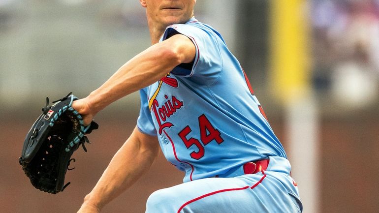 St. Louis Cardinals pitcher Sonny Gray throws in the third...