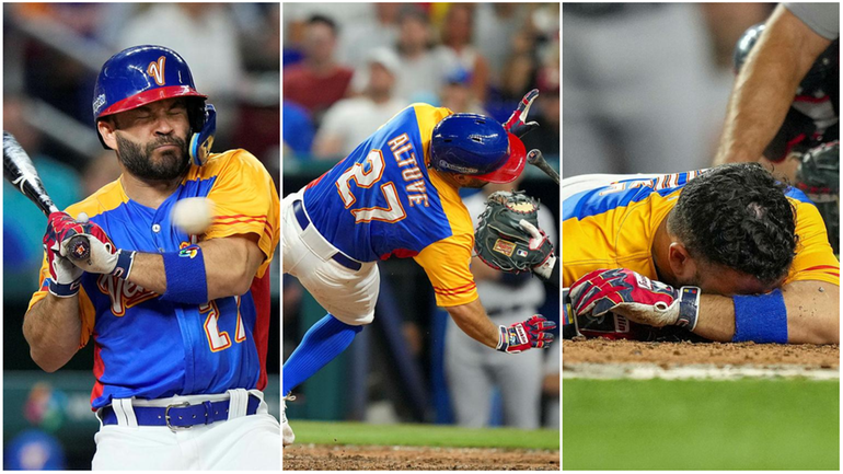 Team Venezuela's Jose Altuve, of the Houston Astros, was hit...