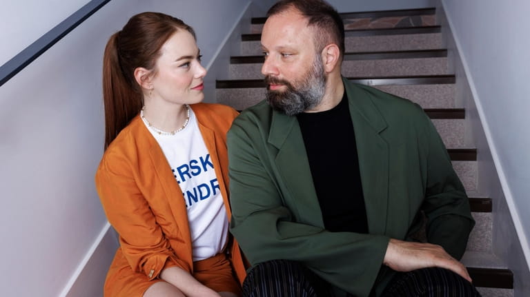 Emma Stone, left, and director Yorgos Lanthimos pose for a...