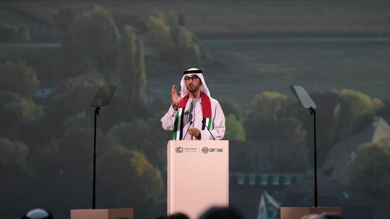 COP28 President Sultan al-Jaber speaks during a session at the...