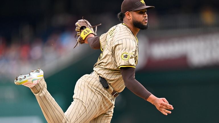 San Diego Padres starting pitcher Randy Vasquez follows through during...