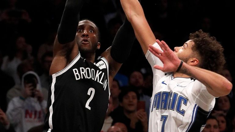 Taurean Prince of the Nets attempts a game-tying shot during...