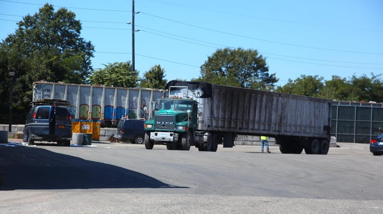 Trucks at One World Recycling on Queens Avenue in Lindenhurs,...