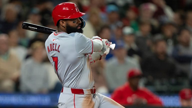 Los Angeles Angels' Jo Adell hits a two-run single during...