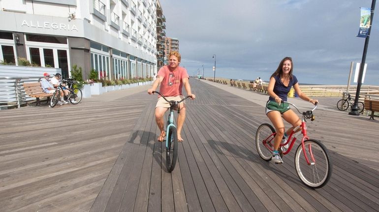 Biking the boardwalk is one of several ways to enjoy the...