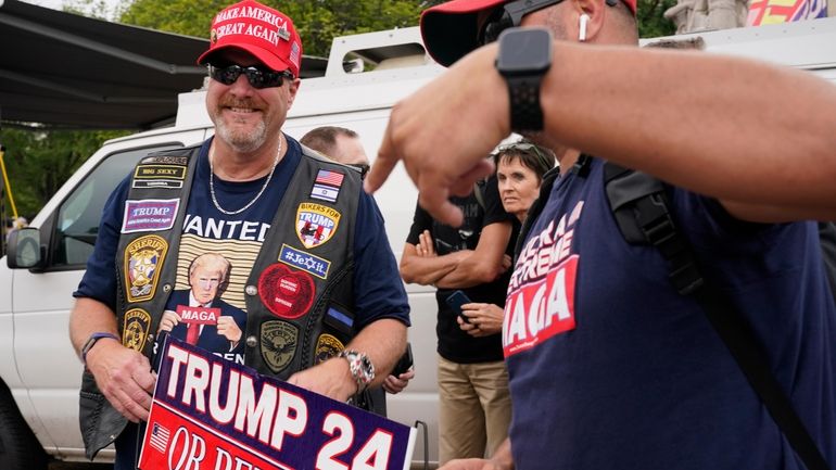 Supporters of Former President Donald Trump gather near the Federal Courthouse,...