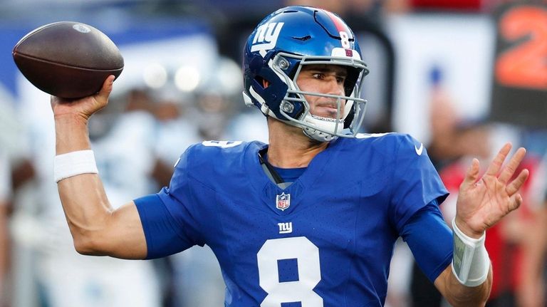 Giants quarterback Daniel Jones throws a pass against the Panthers during...