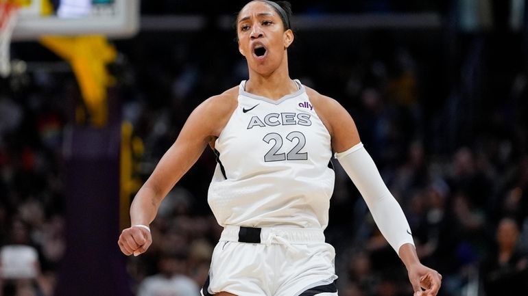 Las Vegas Aces center A'ja Wilson reacts after scoring during...