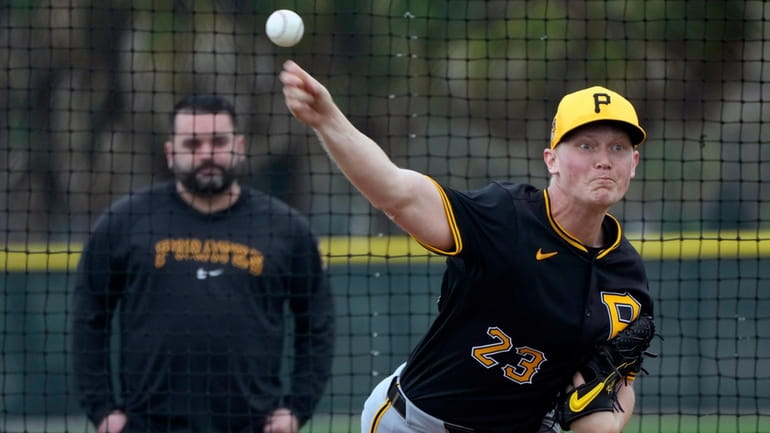 Pittsburgh Pirates starting pitcher Mitch Keller throws during a baseball...