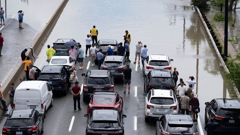 Drivers are stranded due to flood waters blocking the Don...