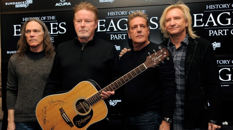 Members of The Eagles, from left, Timothy B. Schmit, Don...