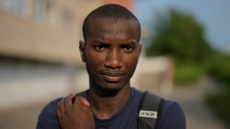 Omar Diallo, a 22-year-old migrant from Guinea in West Africa,...