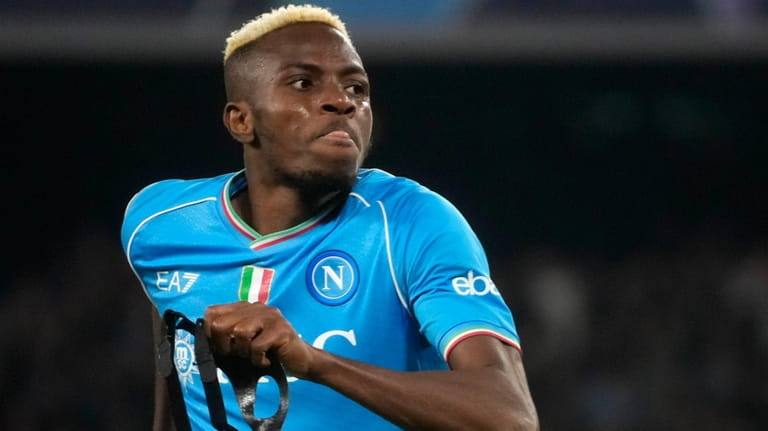 Napoli's Victor Osimhen celebrates after scoring his side's opening goal...