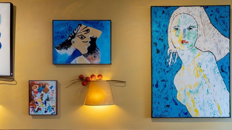 Paintings inside Demarchelier in Greenport.