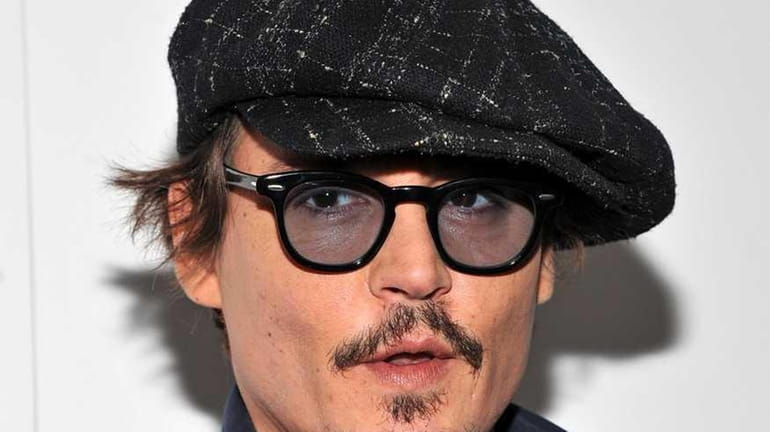 Johnny Depp attends the "The Rum Diary" New York premiere...