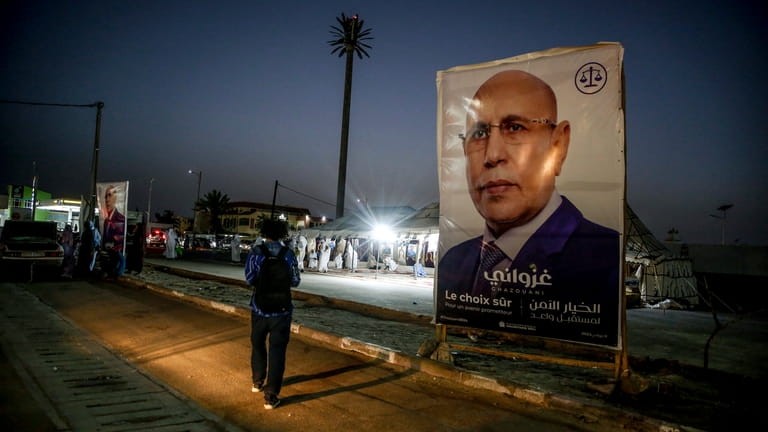 An electoral banner for Mauritanian president Mohamed Ould Ghazouani is...