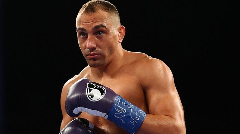 Cletus Seldin faces Roberto Ortiz during their Junior Welterweight bout...