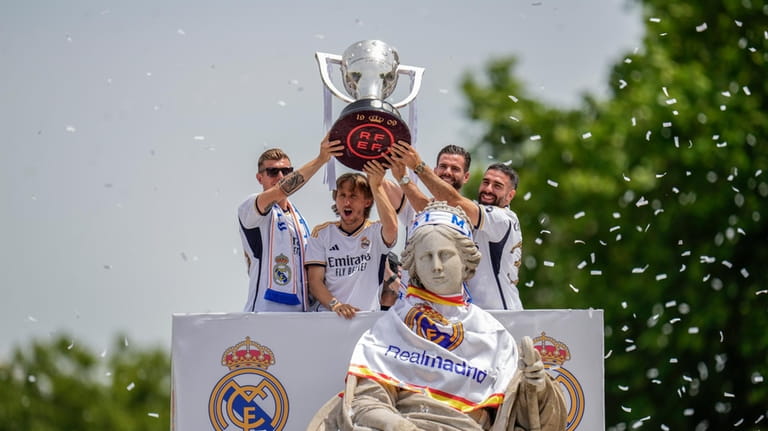 From left, Real Madrid's Toni Kroos, Luka Modric, Nacho and...