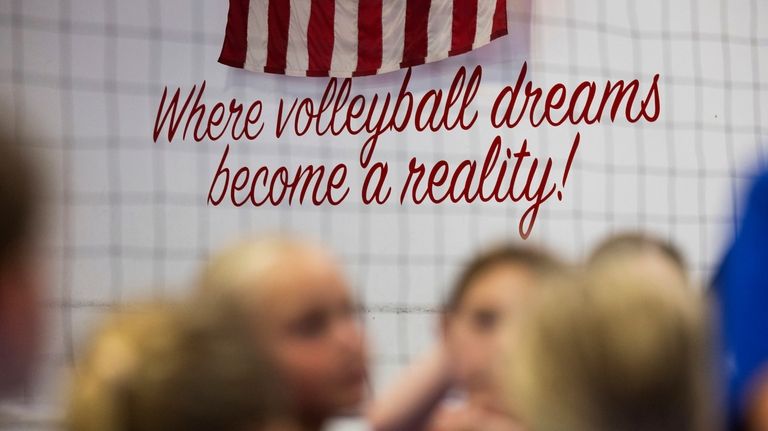 Text that reads, "Where volleyball dreams become a reality!" adorns...