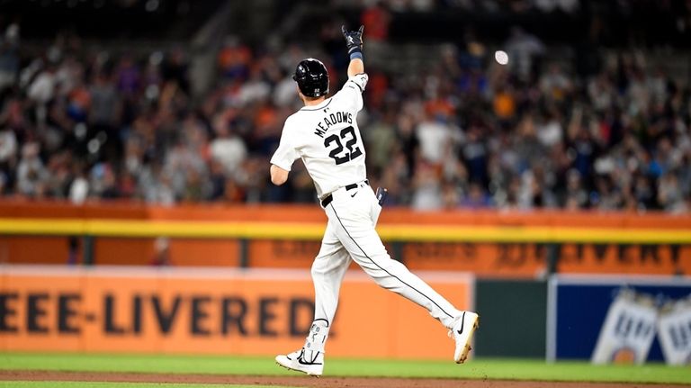 Detroit Tigers' Parker Meadows reacts after hitting a home run...