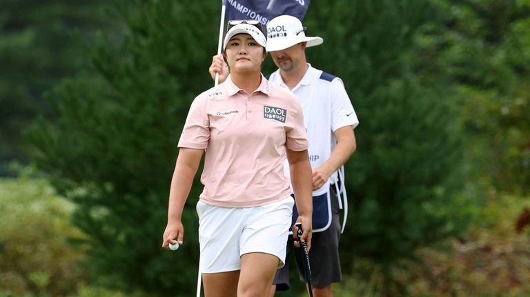 Haeran Ryu,of South Korea, walks off the 15th green after...