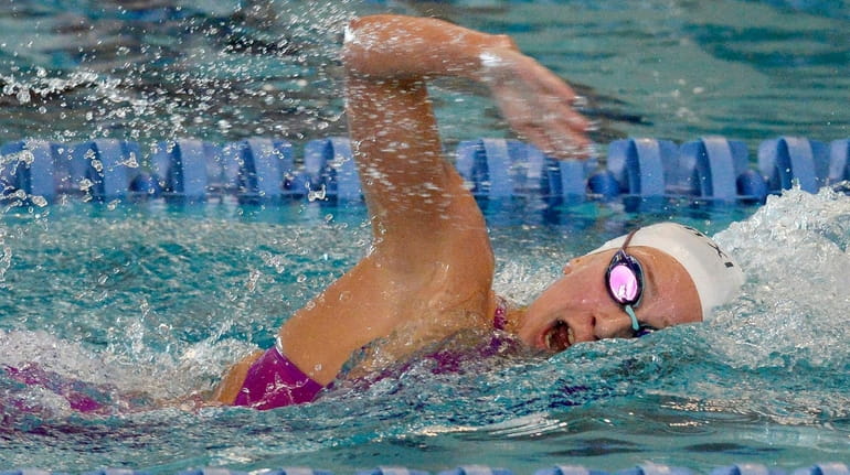 Northport-Commack's Chloe Stepanek swims in a preliminary heat of the...