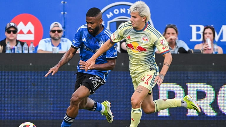 CF Montreal's Ruan (22) gets by New York Red Bulls'...