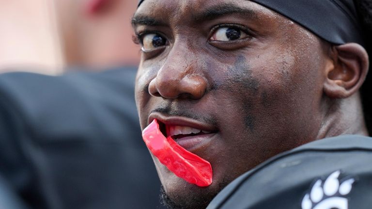 Cincinnati quarterback Emory Jones stands on the sideline during the...