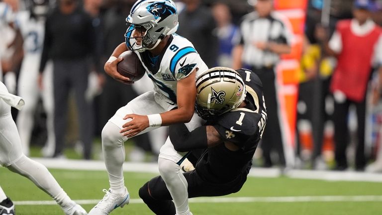 New Orleans Saints cornerback Alontae Taylor (1) sacks Carolina Panthers...