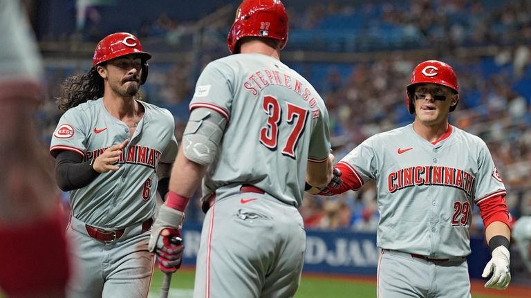 Cincinnati Reds' Jonathan India (6) and TJ Friedl (29) celebrate...