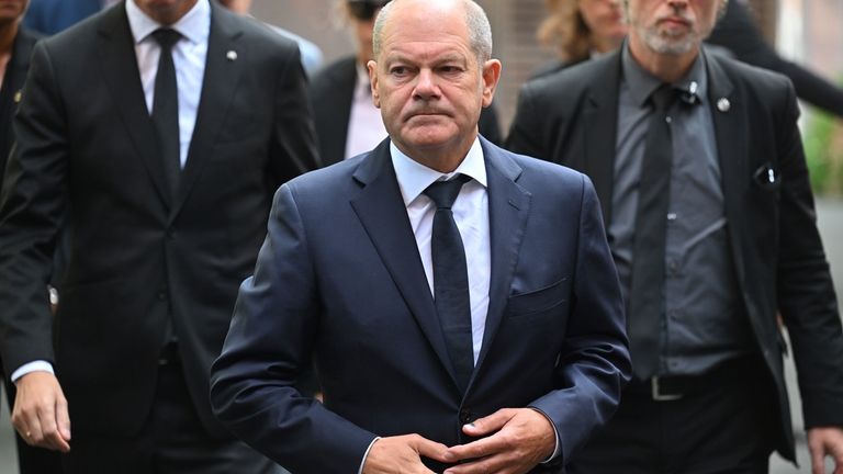 Germany Chancellor Olaf Scholz visits the scene of a knife...